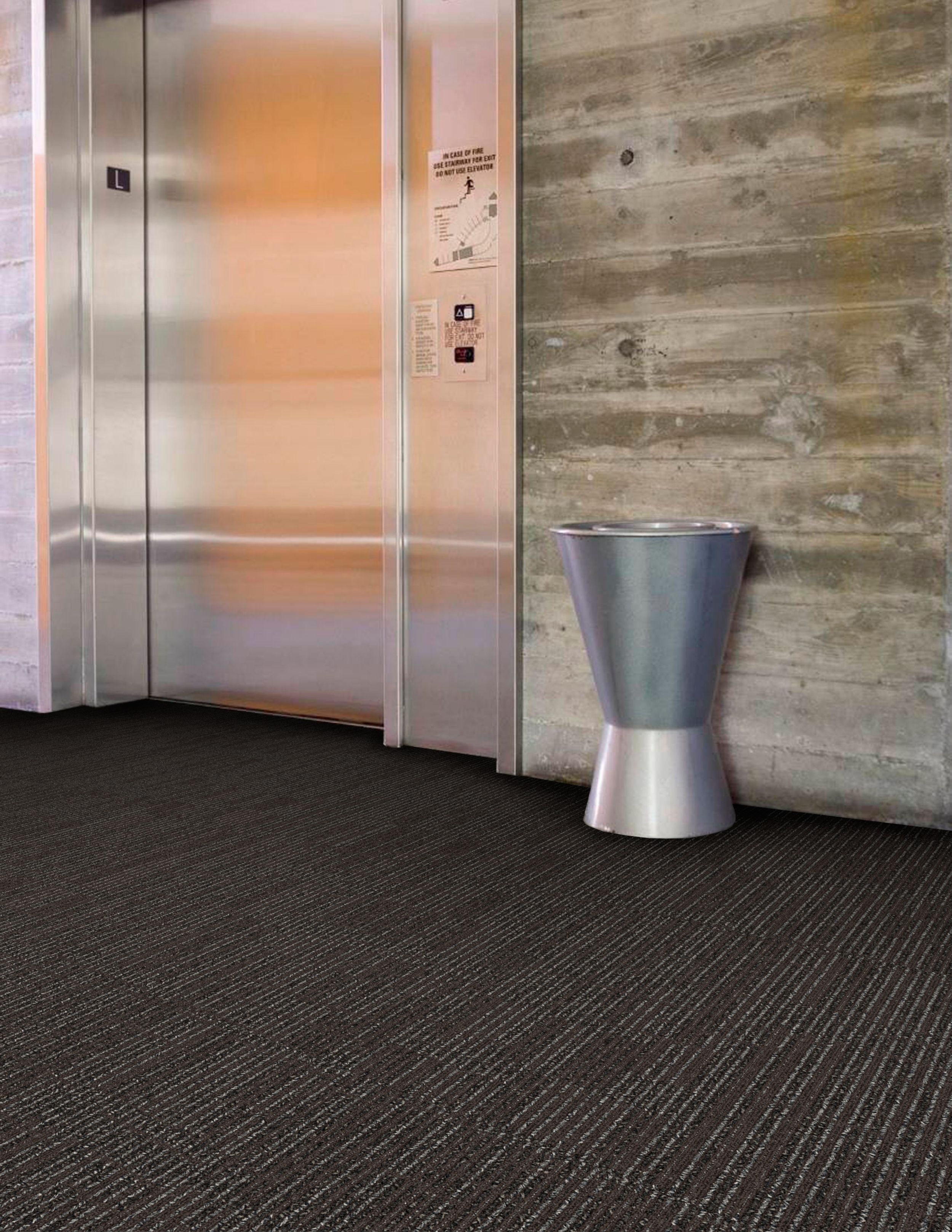 Interface SR899 carpet tile in elevator bank image number 3